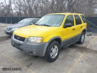2001 Ford Escape XLT with VIN 1FMYU04171KE58419, listed as a IAAI auction lot 41723939 with 176,759 mi miles. Bid and sale history available at carsss.com. Image 2.