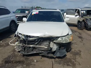 2001 Toyota Avalon XL z VIN 4T1BF28B71U166532, wystawiony jako IAAI lot #42149996 z przebiegiem 172 698 mil mil oraz . Historia ofert i sprzedaży dostępna na DreamBid. Obrazek 6.