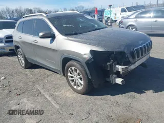 2019 Jeep Cherokee Latitude with VIN 1C4PJLCB4KD175809, listed as a IAAI auction lot 41829035 with 128,231 mi miles. Bid and sale history available at carsss.com. Image 1.