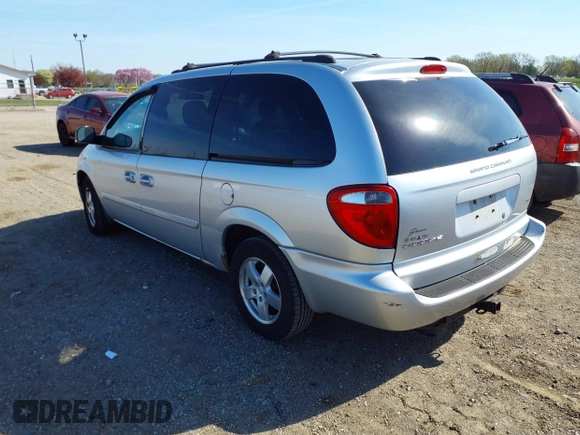 2005 Dodge Caravan SXT with VIN 2D8GP44L75R432427, listed as a IAAI auction lot 42049469 with 129,557 mi miles and . Bid and sale history available at DreamBid. Image 3.