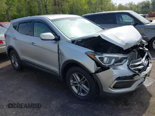 2017 Hyundai Santa Fe 2.4L z VIN 5XYZTDLB7HG457705, wystawiony jako IAAI lot #42097364 z przebiegiem 141 390 mil mil oraz . Historia ofert i sprzedaży dostępna na DreamBid. Obrazek 1.
