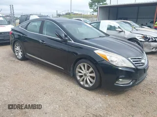 2013 Hyundai Azera z VIN KMHFH4JGXDA285372, wystawiony jako IAAI lot #42697971 z przebiegiem 220 041 mil mil oraz . Historia ofert i sprzedaży dostępna na DreamBid. Obrazek 1.