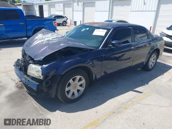 2005 Chrysler 300 with VIN 2C3JA53G25H167944, listed as a IAAI auction lot 41963114 with 196,635 mi miles. Bid and sale history available at carsss.com. Image 18.