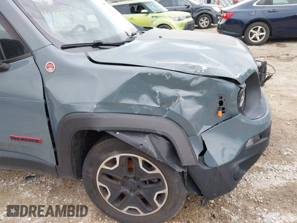 2015 Jeep Renegade Trailhawk z VIN ZACCJBCT4FPB79254, wystawiony jako IAAI lot #41965451 z przebiegiem 87 398 mil mil oraz . Historia ofert i sprzedaży dostępna na DreamBid. Obrazek 6.