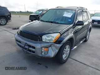 2001 Toyota RAV4 with VIN JTEGH20V910029962, listed as a IAAI auction lot 42092441 with 148,966 mi miles and . Bid and sale history available at DreamBid. Image 6.