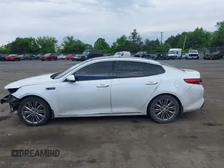 2016 Kia Optima SXL Turbo with VIN 5XXGV4L26GG067859, listed as a IAAI auction lot 42223073 with 133,511 mi miles and . Bid and sale history available at DreamBid. Image 14.