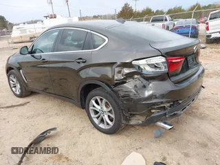 2015 BMW X6 xDrive35i z VIN 5UXKU2C56F0N76862, wystawiony jako IAAI lot #41747776 z przebiegiem 119 426 mil mil oraz . Historia ofert i sprzedaży dostępna na DreamBid. Obrazek 3.