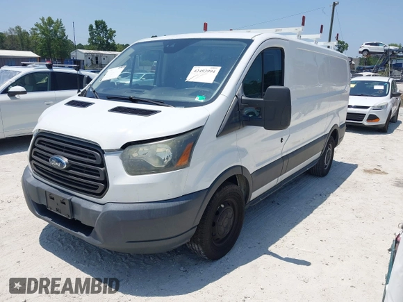 2015 Ford Transit Cargo z VIN 1FTNE1YM9FKA16926, wystawiony jako IAAI lot #42493994 z przebiegiem 218 427 mil mil oraz . Historia ofert i sprzedaży dostępna na DreamBid. Obrazek 2.