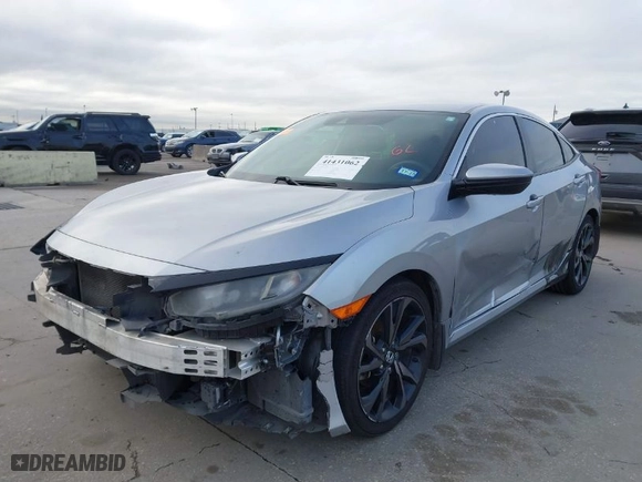 2019 Honda Civic Sedan Sport with VIN 19XFC2F8XKE015898, listed as a IAAI auction lot 41431062 with 108,071 mi miles. Bid and sale history available at carsss.com. Image 2.