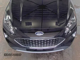 2021 Ford Escape SEL Hybrid with VIN 1FMCU9CZ5MUA50807, listed as a IAAI auction lot 42403857 with 85,299 mi miles and . Bid and sale history available at DreamBid. Image 1.