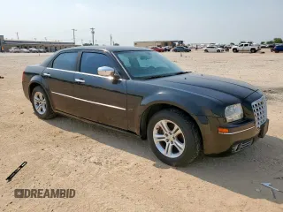 2010 Chrysler 300 Touring z VIN 2C3CA5CV0AH125757, wystawiony jako Copart lot #57422895 z przebiegiem 184 101 mil mil oraz Szkoda całkowita • Salvage title. Historia ofert i sprzedaży dostępna na DreamBid. Obrazek 4.