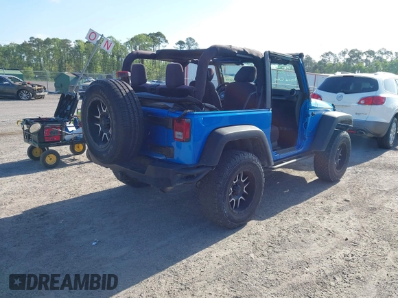 2015 Jeep Wrangler Sport z VIN 1C4AJWAG8FL550859, wystawiony jako IAAI lot #42154946 z przebiegiem 143 658 mil mil oraz . Historia ofert i sprzedaży dostępna na DreamBid. Obrazek 4.
