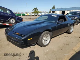 1989 Pontiac Firebird z VIN 1G2FS21E6KL245532, wystawiony jako Copart lot #77085424 z przebiegiem 134 957 mil mil oraz Czysty tytuł • Clean title. Historia ofert i sprzedaży dostępna na DreamBid. Obrazek 1.