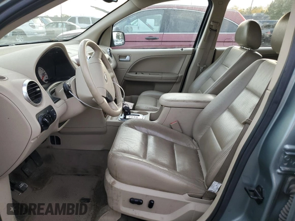 2005 Ford Freestyle Limited with VIN 1FMDK06105GA71334, listed as a Copart auction lot 74270784 with 56,228 mi miles and Salvage Title. Bid and sale history available at carsss.com. Image 7.