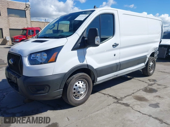 2021 Ford Transit Cargo with VIN 1FTBR2Y80MKA35393, listed as a IAAI auction lot 41732236 with 24,799 mi miles and . Bid and sale history available at DreamBid. Image 17.