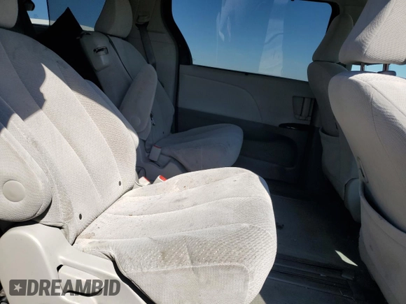 2011 Toyota Sienna LE AAS с VIN 5TDKK3DC3BS133408, выставлен на аукционе Copart как лот 72582564 с пробегом 128 168 миль миль и Списание • Salvage title. История ставок и продаж доступна на DreamBid. Изображение 11.