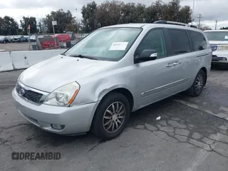 2012 Kia Sedona EX with VIN KNDMH4C72C6494230, listed as a IAAI auction lot 41522317 with 120,292 mi miles. Bid and sale history available at carsss.com. Image 2.