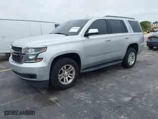 2016 Chevrolet Tahoe LS with VIN 1GNSCAKC5GR369222, listed as a IAAI auction lot 41216640 with 95,549 mi miles. Bid and sale history available at carsss.com. Image 2.