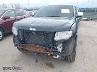 2012 Jeep Grand Cherokee Overland with VIN 1C4RJFCG3CC148601, listed as a IAAI auction lot 41717658 with 127,681 mi miles. Bid and sale history available at carsss.com. Image 6.