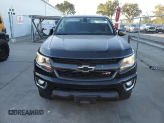 2019 Chevrolet Colorado 2WD Z71 with VIN 1GCGSDEN1K1314774, listed as a Copart auction lot 77212044 with 74,689 mi miles and Salvage Title. Bid and sale history available at carsss.com. Image 5.