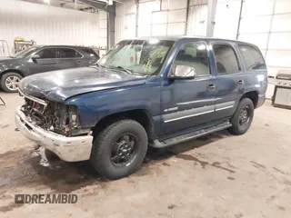 2002 Chevrolet Tahoe LS with VIN 1GNEC13V32R141872, listed as a IAAI auction lot 40994532 with 207,626 mi miles. Bid and sale history available at carsss.com. Image 2.