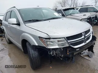 2014 Dodge Journey SXT z VIN 3C4PDCBB7ET121766, wystawiony jako IAAI lot #41649580 z przebiegiem 151 018 mil mil oraz . Historia ofert i sprzedaży dostępna na DreamBid. Obrazek 1.