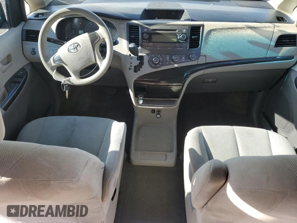 2014 Toyota Sienna L с VIN 5TDZK3DC5ES451825, выставлен на аукционе Copart как лот 79619074 с пробегом 151 146 миль миль и Списание • Salvage title. История ставок и продаж доступна на DreamBid. Изображение 8.