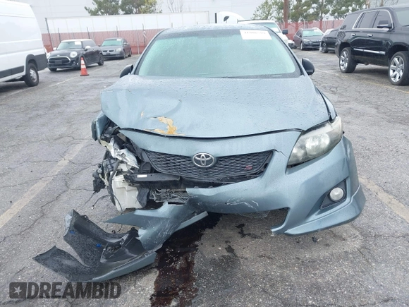 2009 Toyota Corolla with VIN 1NXBU40E49ZO81912, listed as a IAAI auction lot 41806599 with 216,989 mi miles. Bid and sale history available at carsss.com. Image 6.