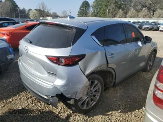 2021 Mazda CX-5 Grand Touring with VIN JM3KFADM6M0387094, listed as a Copart auction lot 48350845 with 94,701 mi miles and Salvage Title. Bid and sale history available at carsss.com. Image 3.