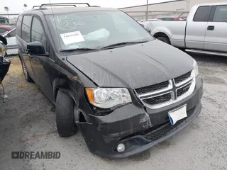 2018 Dodge Grand Caravan SXT z VIN 2C4RDGCG9JR266069, wystawiony jako IAAI lot #41858189 z przebiegiem 101 541 mil mil oraz . Historia ofert i sprzedaży dostępna na DreamBid. Obrazek 1.