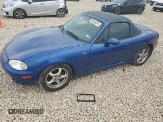 1999 Mazda MX-5 Miata z VIN JM1NB3532X0134801, wystawiony jako Copart lot #83838374 z przebiegiem 97 015 mil mil oraz Szkoda całkowita • Salvage title. Historia ofert i sprzedaży dostępna na DreamBid. Obrazek 1.