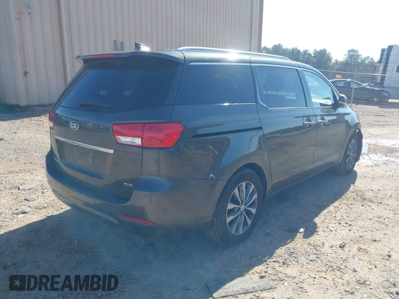 2016 Kia Sedona EX with VIN KNDMC5C11G6184513, listed as a IAAI auction lot 41488816 with 184,476 mi miles. Bid and sale history available at carsss.com. Image 4.