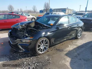 2022 Genesis G70 2.0T with VIN KMTG34TA0NU098580, listed as a IAAI auction lot 41763511 with 87,816 mi miles. Bid and sale history available at carsss.com. Image 2.