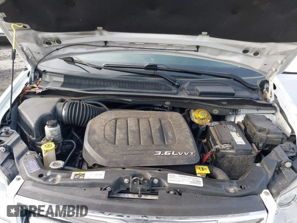 2016 Chrysler Town & Country Touring with VIN 2C4RC1BG8GR205497, listed as a IAAI auction lot 41774882 with 105,159 mi miles. Bid and sale history available at carsss.com. Image 10.