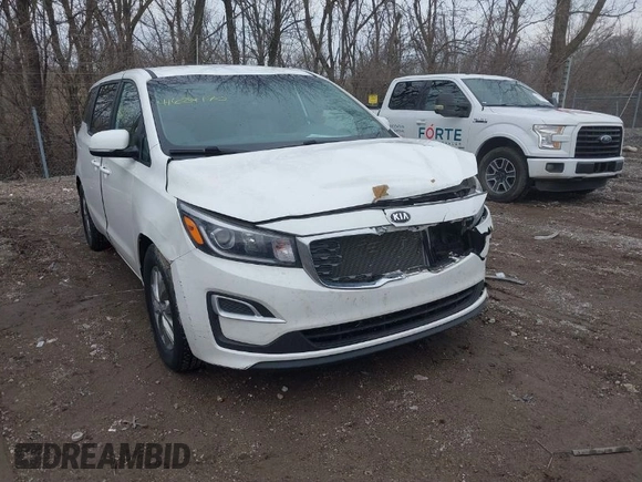 2021 Kia Sedona LX with VIN KNDMB5C19M6662112, listed as a IAAI auction lot 41684140 with 57,874 mi miles. Bid and sale history available at carsss.com. Image 1.