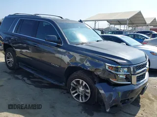 2017 Chevrolet Tahoe LT z VIN 1GNSCBKC9HR191807, wystawiony jako IAAI lot #42655583 z przebiegiem 149 090 mil mil oraz . Historia ofert i sprzedaży dostępna na DreamBid. Obrazek 1.