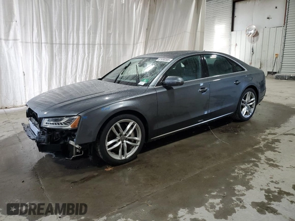 2015 Audi A8 z VIN WAUJGAFDXFN008499, wystawiony jako Copart lot #87658385 z przebiegiem 103 175 mil mil oraz Szkoda całkowita • Salvage title. Historia ofert i sprzedaży dostępna na DreamBid. Obrazek 1.