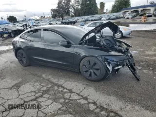 2025 Tesla Model 3 Long Range z VIN 5YJ3E1EA2SF907679, wystawiony jako Copart lot #48718815 z przebiegiem Nie podano mil oraz Szkoda całkowita • Salvage title. Historia ofert i sprzedaży dostępna na DreamBid. Obrazek 1.