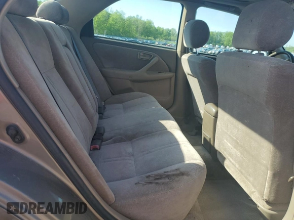 1999 Toyota Camry LE z VIN JT2BG22K0X0295893, wystawiony jako Copart lot #56183655 z przebiegiem 327 172 mil mil oraz Szkoda całkowita • Salvage title. Historia ofert i sprzedaży dostępna na DreamBid. Obrazek 10.