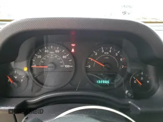 2009 Jeep Wrangler X с VIN 1J4FA24169L775219, выставлен на аукционе Copart как лот 71110304 с пробегом 132 886 миль миль и Списание • Salvage title. История ставок и продаж доступна на DreamBid. Изображение 9.