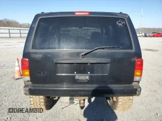 1997 Jeep Cherokee Country with VIN 1J4FJ78S2VL574492, listed as a Copart auction lot 88568685 with 244,465 mi miles and Salvage Title. Bid and sale history available at carsss.com. Image 6.