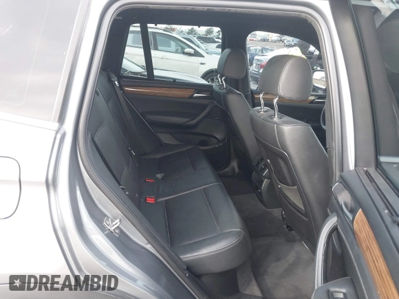 2013 BMW X3 xDrive35i with VIN 5UXWX7C5XDL977879, listed as a IAAI auction lot 41396936 with 107,727 mi miles and . Bid and sale history available at DreamBid. Image 8.