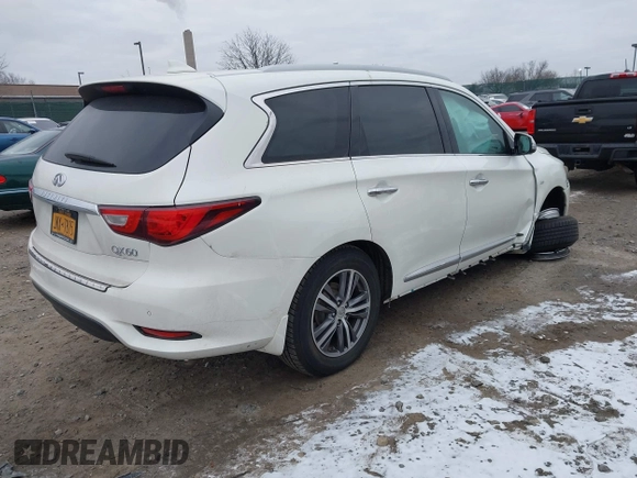 2016 Infiniti QX60 with VIN 5N1AL0MM1GC520429, listed as a IAAI auction lot 41286912 with 65,512 mi miles and . Bid and sale history available at DreamBid. Image 4.