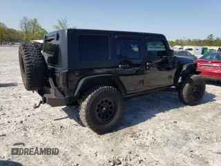 2013 Jeep Wrangler Unlimited Moab with VIN 1C4HJWEG7DL600043, listed as a Copart auction lot 52146945 with 118,882 mi miles and Salvage title. Bid and sale history available at DreamBid. Image 3.
