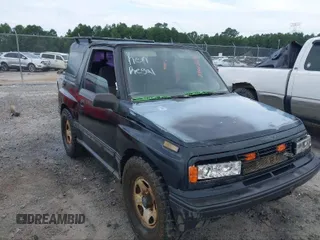 1995 Geo Tracker z VIN 2CNBE18U0S6943292, wystawiony jako IAAI lot #41274067 z przebiegiem Nie podano mil oraz . Historia ofert i sprzedaży dostępna na DreamBid. Obrazek 2.