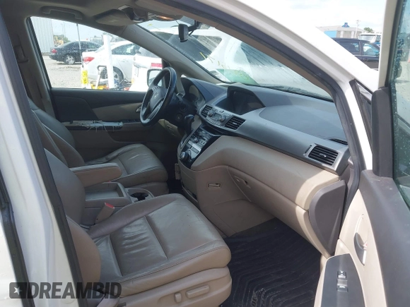 2011 Honda Odyssey EX-L with VIN 5FNRL5H60BB026171, listed as a IAAI auction lot 42511296 with 288,827 mi miles and . Bid and sale history available at DreamBid. Image 5.
