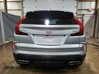 2024 Cadillac XT4 FWD Premium Luxury with VIN 1GYFZCR48RF141684, listed as a Copart auction lot 47552185 with 26,958 mi miles and Clean title. Bid and sale history available at DreamBid. Image 6.
