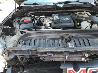 2021 GMC Sierra 1500 AT4 with VIN 3GTU9EET8MG308333, listed as a Copart auction lot 70448405 with 107,257 mi miles and Salvage title. Bid and sale history available at DreamBid. Image 15.
