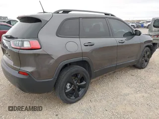 2020 Jeep Cherokee Latitude Plus with VIN 1C4PJLLB2LD570914, listed as a IAAI auction lot 40933764 with 49,886 mi miles. Bid and sale history available at carsss.com. Image 4.