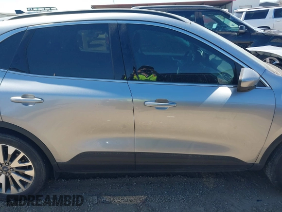 2021 Ford Escape Titanium Hybrid z VIN 1FMCU0DZ3MUB04065, wystawiony jako IAAI lot #41764797 z przebiegiem 28 881 mil mil oraz . Historia ofert i sprzedaży dostępna na DreamBid. Obrazek 14.